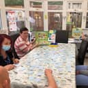 Joba has donated board games to Jasmine House Care Home