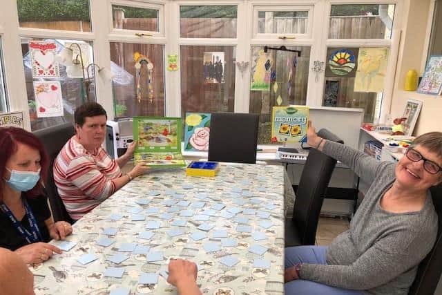 Joba has donated board games to Jasmine House Care Home