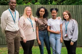 Hightown Housing Heroes (L to R) support worker Nigel Greenaway, support worker Carol Goodman, resident Emuka, resident Fortuna and support worker Kia Nolan