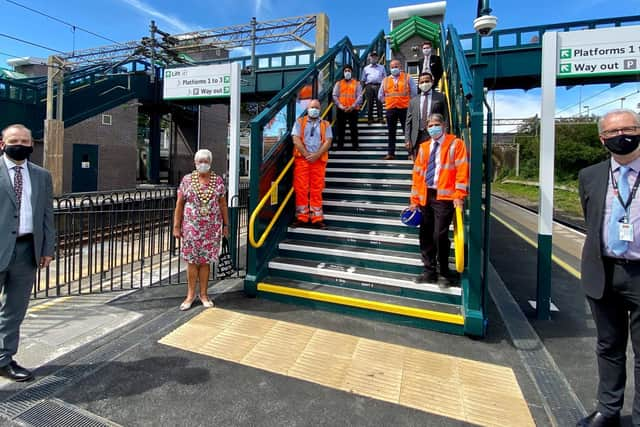 Chris Heaton-Harris MP (L), James Dean, West Coast South route director Network Rail (R) at opening of Tring station's Access for All upgrade (C) Network Rail