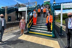 Chris Heaton-Harris MP (L), James Dean, West Coast South route director Network Rail (R) at opening of Tring station's Access for All upgrade (C) Network Rail