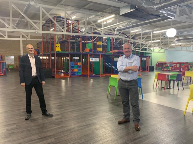 Owner Mark Whittington with Hemel Hempstead MP Sir Mike Penning at DJ's Play Park