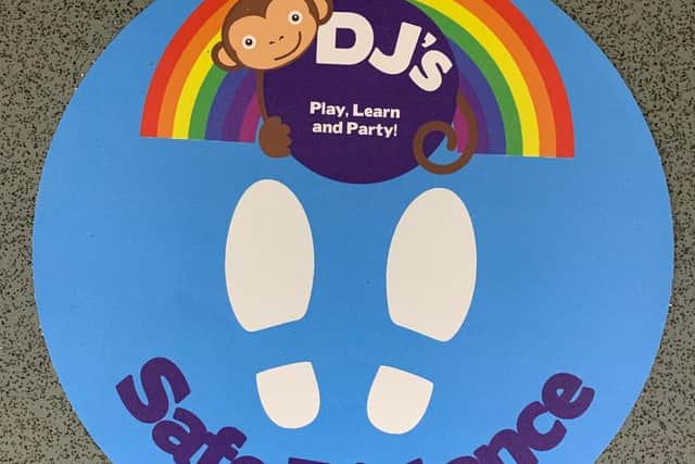 One of the floor signs at DJ's Play Park