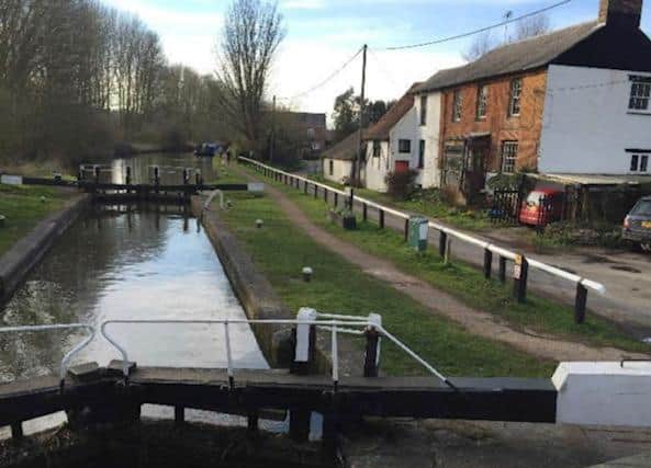 Photo of Dudswell, with the trees lining the canal on the left