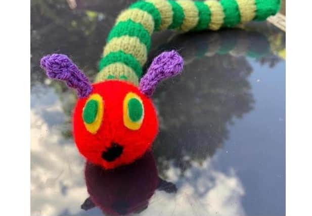 A caterpillar that will go on one of the toppers