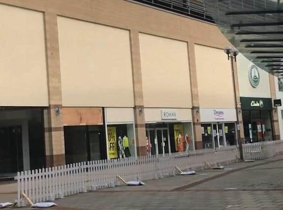 Planters will be used to replace the current social distancing barriers