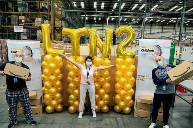 Hemel Hempstead's Amazon team donates £1,000 to Children with Cancer UK