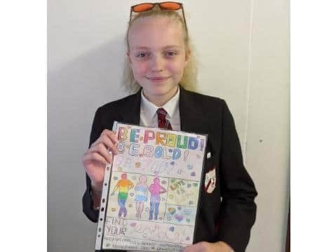Megan Whale in year 8 who won the poster designing contest