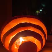 A rainbow carved into a pumpkin for Halloween