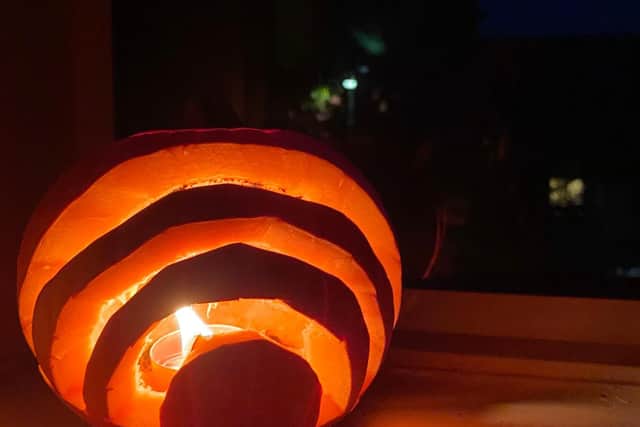 A rainbow carved into a pumpkin for Halloween