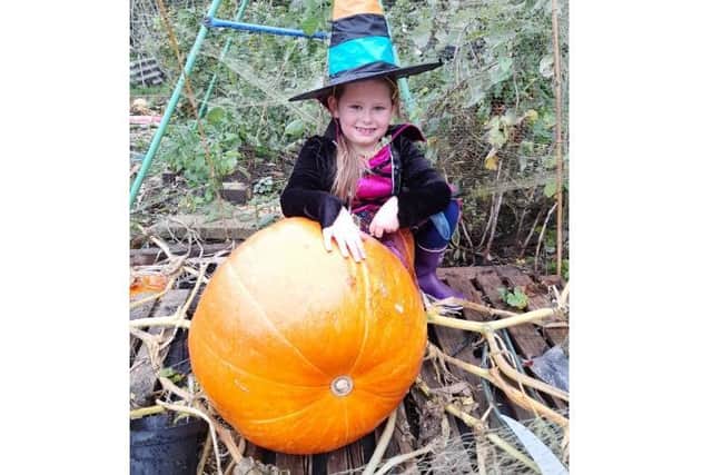 Aoife and the pumpkin she grew