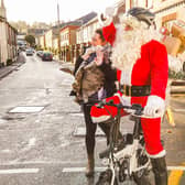 Santa swaps reindeer for electric bike