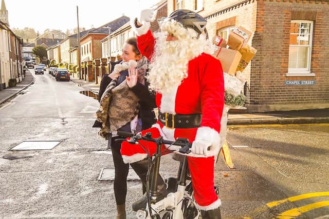Santa swaps reindeer for electric bike