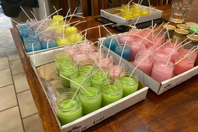 She made candles to raise the money