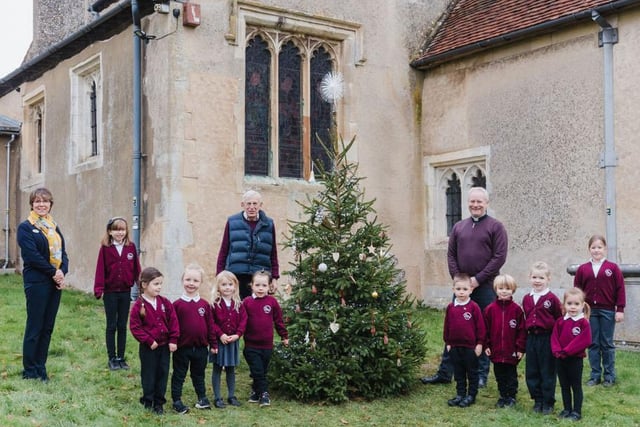 The vicar and churchwarden with children and headmistress from Great Gaddesden School (C) Sally Masson Photography