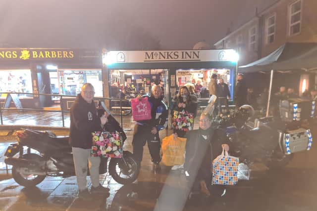 Dacorum Motorcycle Riders and staff from The Monks Inn handed over donated gifts to the hospital's charity team