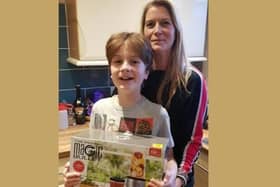 Emma Jenkins and son Austin with the new blender they received