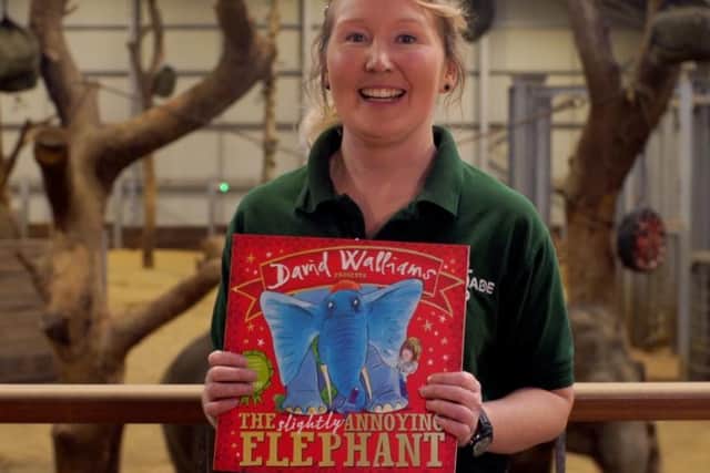 Elephant keeper Eimear Daly with The Slightly Annoying Elephant by David Walliams (C) ZSL Matt Worthington