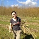 Candice Hunt collecting wood for the pen project