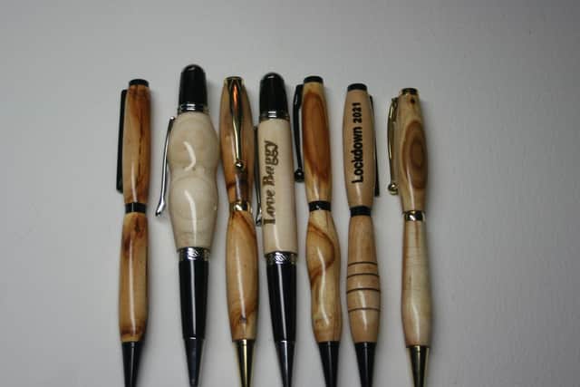 The hedgerow pens are made from different kinds of homegrown wood