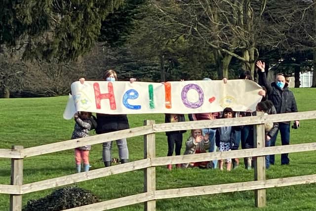 A socially distanced 'Hello!' brought a smile to everyone's faces
