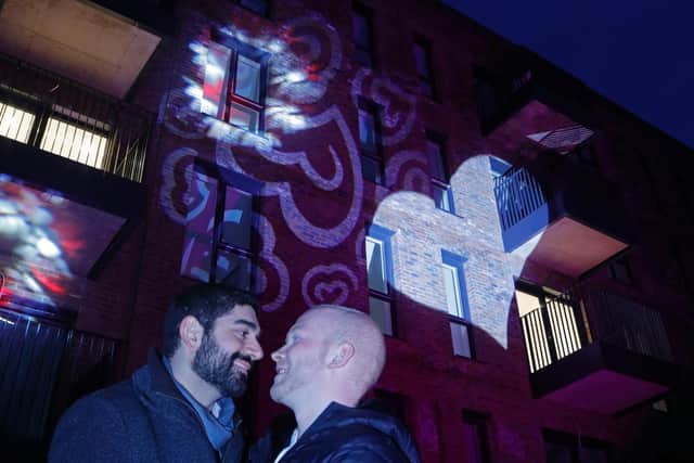 Housebuilder celebrates Valentine's Day with projection of love hearts at The Gade as Hemel couple reserve their first home