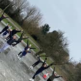 Skaters take advantage of the cold weather by practicing their routines on frozen puddles in Hemel Hempstead