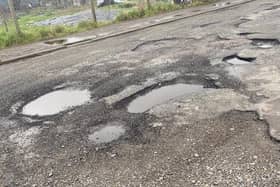 Residents call for Taylor Wimpey to repair dangerous road