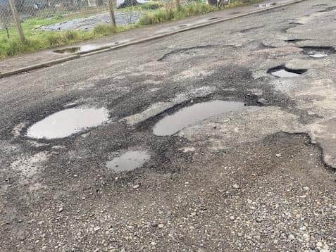 Residents call for Taylor Wimpey to repair dangerous road