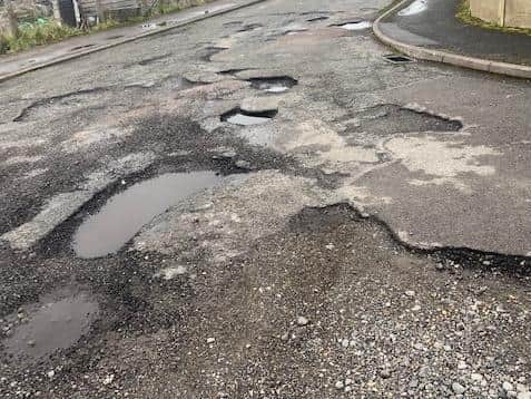 Frustrated residents are calling on Taylor Wimpey to repair a dangerous road near their homes before someone hurts themselves