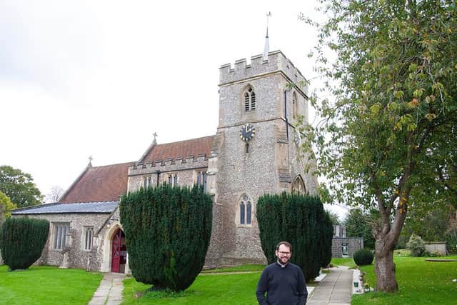 Father James, Team Vicar of All Saints, outside All Saints Church