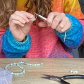 Holly started a new business, Little Peach Crafts, selling handcrafted earrings on her online shop on Etsy