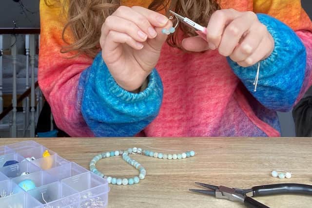 Holly started a new business, Little Peach Crafts, selling handcrafted earrings on her online shop on Etsy