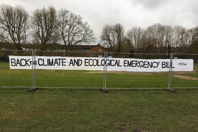 Volunteers supporting the Climate and Ecological Emergency Bill, placed a banner at the Moor