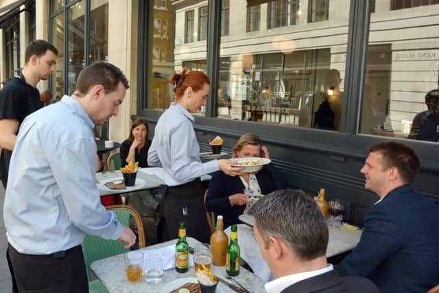 Uncertain future for restaurant and pub workers. (C) Shutterstock