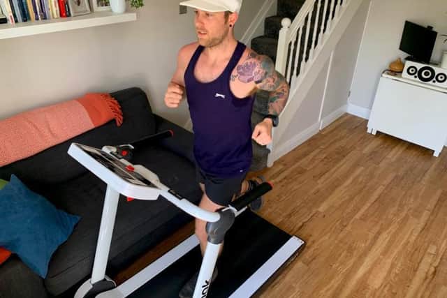 Andrew Fulford on his treadmill where he will run 85km for charity on 25 April