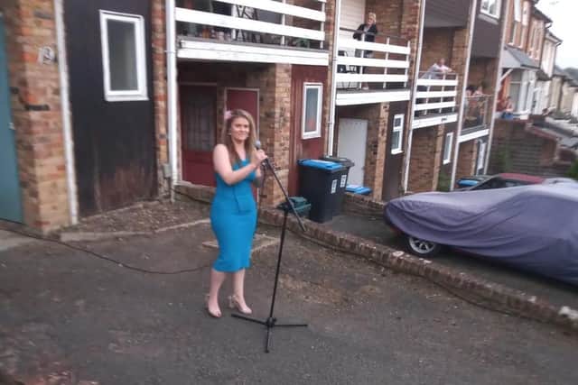 Elizabeth's neighbours have asked her to sing every Thursday
