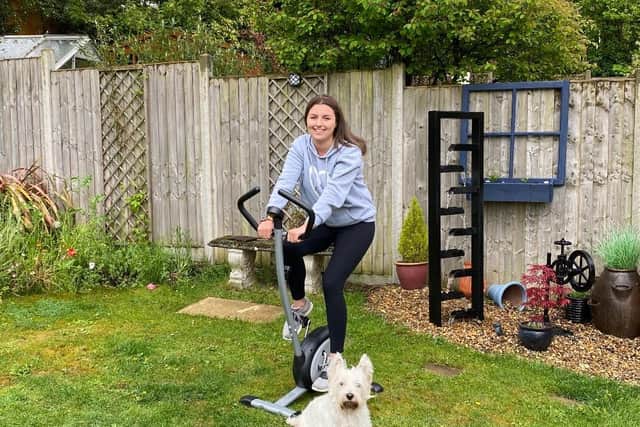 Layla is cycling 320.1 miles in her garden to raise money for the ambulance service