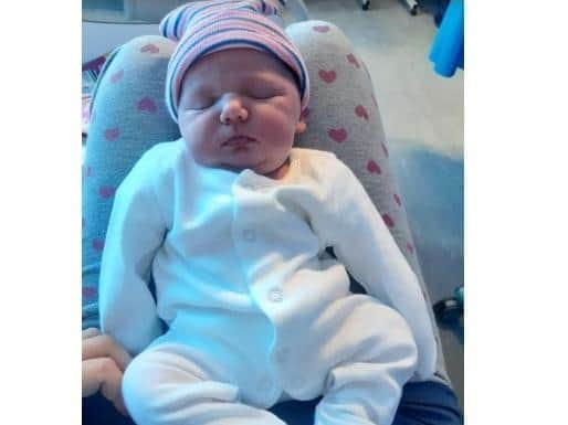 Darcie was born May 13