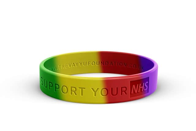 Chris is selling wristbands to raise money for the fund