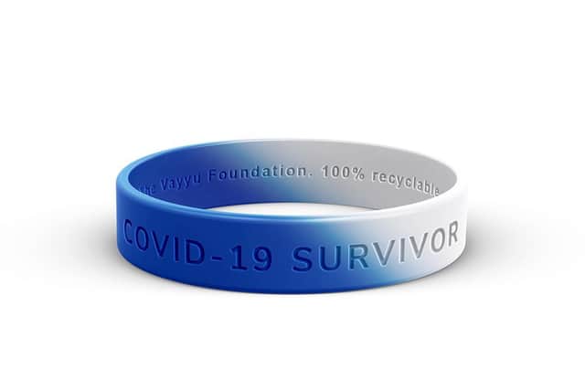 Chris is selling wristbands to raise money for the fund