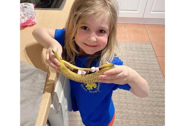 Sara (4th Hemel) preparing a banana boat to go on the fire
