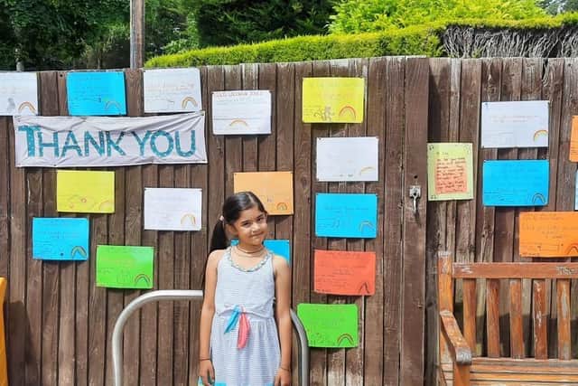 Lilly's jokes are on the forecourt of her family's shop in Little Gaddesden