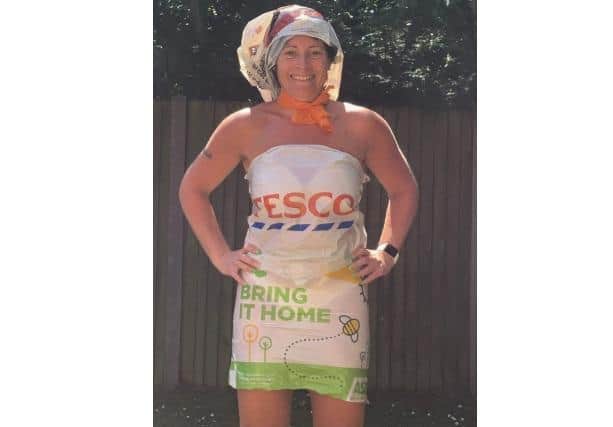 Angela modelling supermarket bags