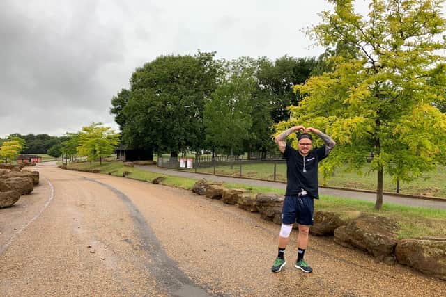 George Spooner, ZSL Zookeeper, at the start of the marathon around Whipsande Zoo. (C) ZSL