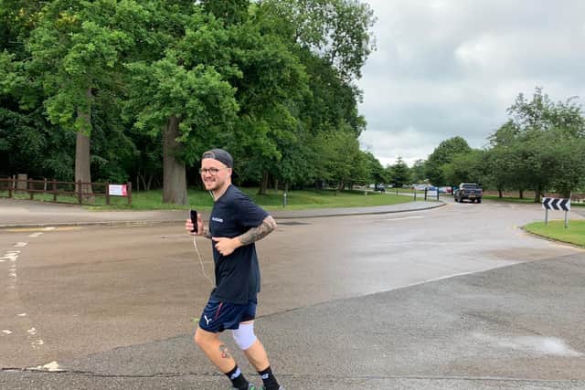 George Spooner, ZSL Zookeeper, running a marathon around Whipsande Zoo. (C) ZSL