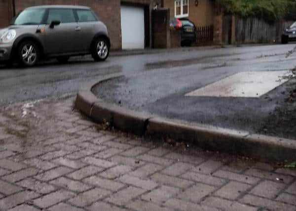 The resident is concerned that if the drains are blocked the water sitting on the roads will make them dangerous in the winter