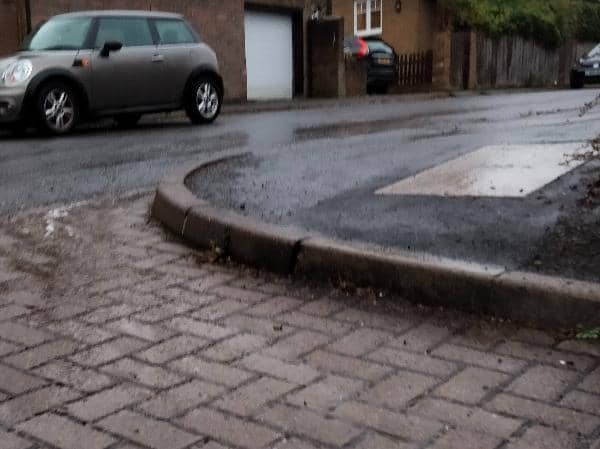 The resident is concerned that if the drains are blocked the water sitting on the roads will make them dangerous in the winter