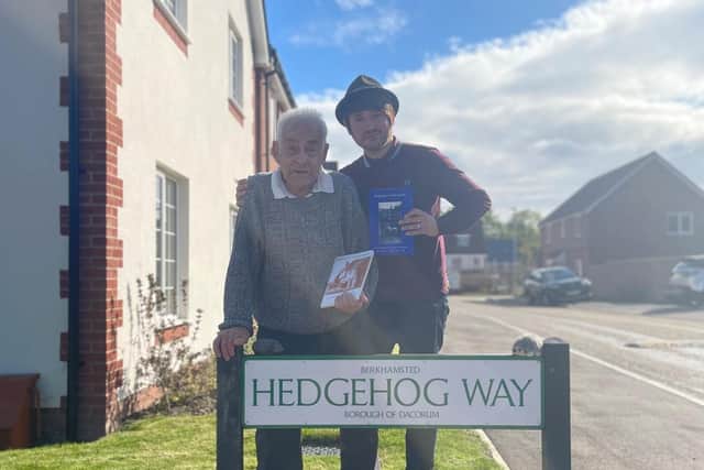 Bert with grandson Ben and his book, Hedgehog's Northchurch: A Personal History of a Village in Hertfordshire