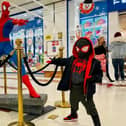 A young Spiderman was excited to see Spiderman